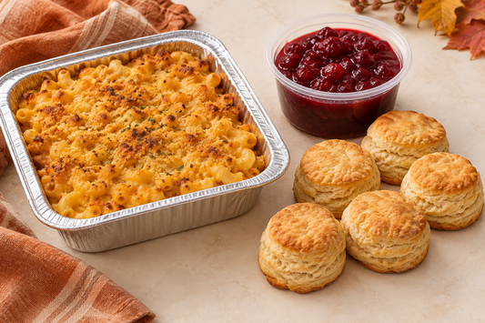 Illustrative Thanksgiving Sidekick Kit with vegan mac and cheeze, cranberry sauce and biscuits